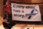 City Hall exhibit helps others walk in the shoes of child abuse victims