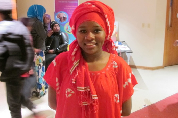 Sahara Aden wore traditional dress to perform a Somali Bantu spiritual dance. (Photo by Rick Brown)