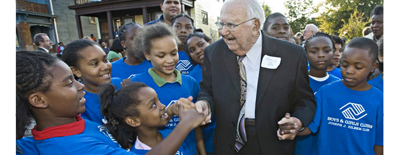 Joseph Zilber, with kids from the Boys and Girls Club.